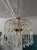 The Paolo Venini chandelier is a stunning work of art and a true statement piece that will add a touch of glamour to any...