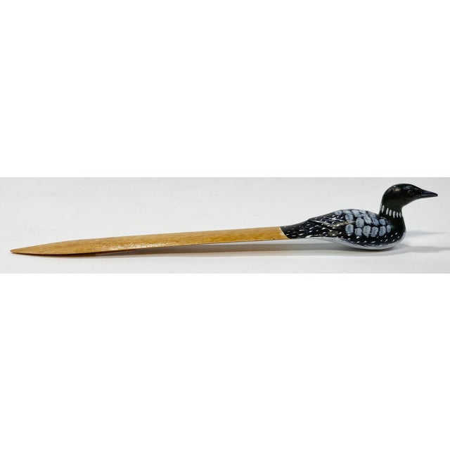 Unique vintage wood carved letter opener. Handle features hand-painted deep blue bird with lighter blue painted details....