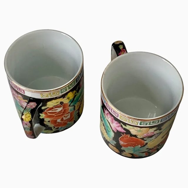 Mario Buatta 1980s Vintage Chinoiserie Black Mugs With Colorful Floral Design and Greek Trim - a Pair For Sale - Image 4 of 7