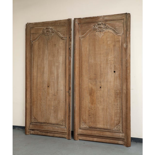 Pair of antique Napoleon III French carved oak panels, c. 1880. These impressive panels stand nearly 9' high and are...