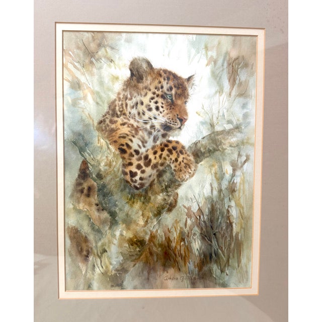 Up for sale is an original watercolor painting by artist Athena Gilliland depicting a realistic leopard cub in a tree. The...