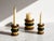 This exceptional, highly collectible set of three modular ceramic candle holders represents a quintessential example of...