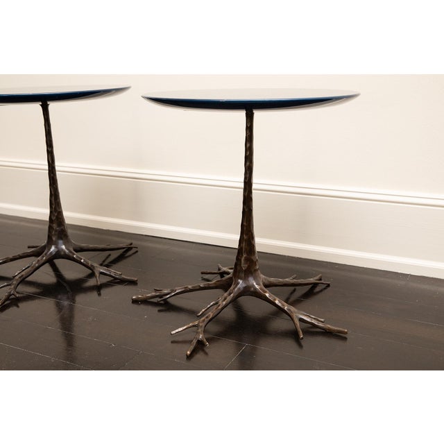 The Branch Side Tables by Van der Straeten showcase an organic elegance, with branching bronze bases supporting richly...