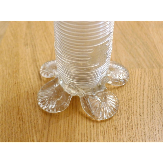 Small Palm Tree Vase; petal-shaped base, cylindrical body entirely decorated with raised filigree, featuring four drooping...