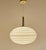 Mid century vintage cocoon pendant light with a flattened composite acrylic globe shade with diamond relief patterns and...
