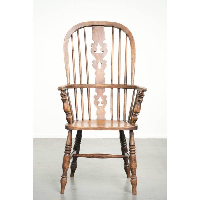 This antique English spindle chair, Windsor chair/occasional chair, dates from the early 19th century and features...