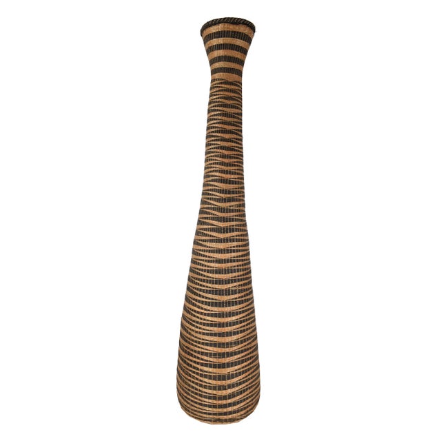 In both Rwanda and neighboring Burundi, woven basketry receptacles and architectural elements constituted the most...