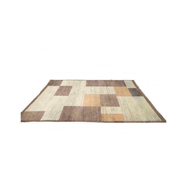 Hand knotted unique rug newly made in Afghanistan using hand spun wool.