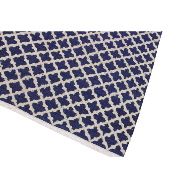 Make a statement in your home with this meticulously hand-knotted high-low pile Moroccan wool rug. An intricate design...