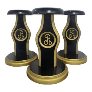 Hollywood Regency Black & Gold Wooden Hat Stands With Monogram “R” - Set of 3 For Sale