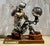 A fantastic custom steampunk sculpture. Completely made from industrial components, including car parts, carpenters plane...