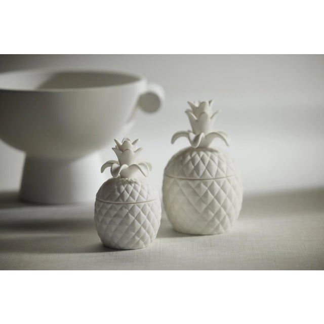 The Ceramic Pineapple Candle is a unique and decorative piece that will add a touch of tropical elegance to any room. With...