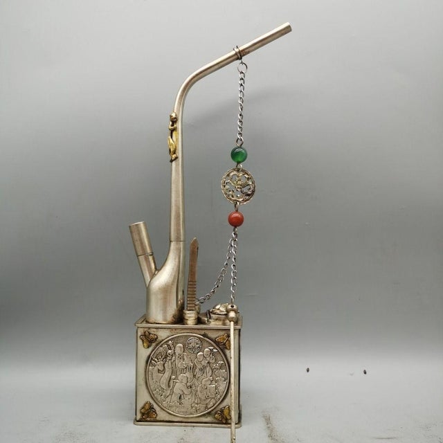 Add a touch of historical intrigue to your collection with this striking vintage-style Chinese water pipe (Shui Yan Dai)....