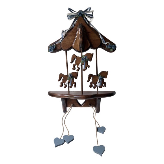 Wooden Wall Shelf a Vintage Carousel, Featuring a Canopy Top, Three Cut-Out Carousel Horses Blue Floral Ribbons, and Dangling Heart Accents. For Sale