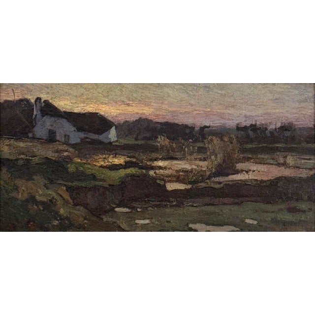 A European oil painting on panel showing a quiet farmhouse beside a pond at the close of day, in its original giltwood...