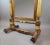 Empire mahogany and giltwood psyche mirror, 19th century