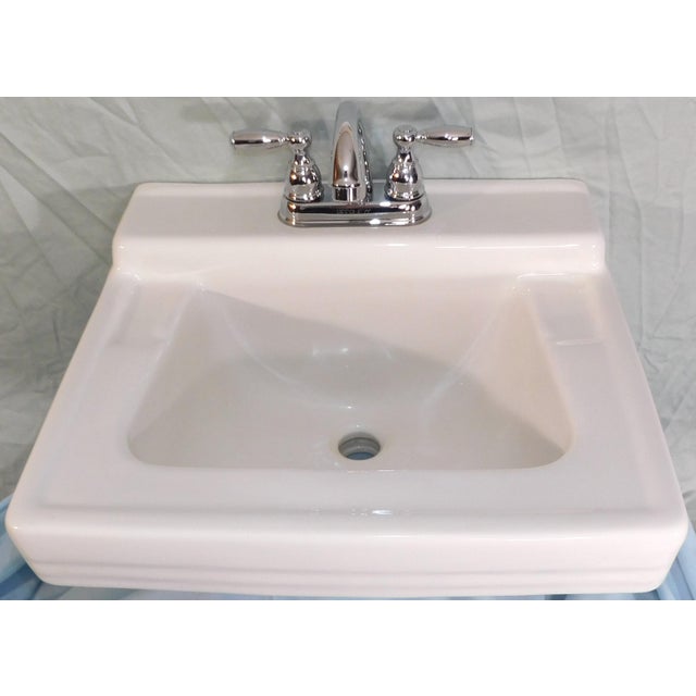 This sink is in very nice condition for it's 63 years, with gleaming white porcelain. Top to bottom conditions: The...