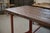 A 1950s workbench with a distinctly industrial character. Thick wooden top with a beautiful patina from use.
