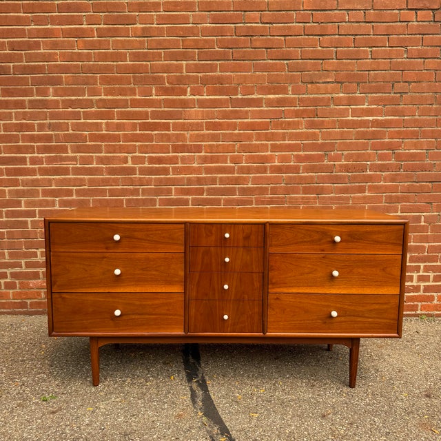 Designed by Kipp Stewart for Drexel’s Declaration collection, this walnut lowboy features the clean lines and balanced...