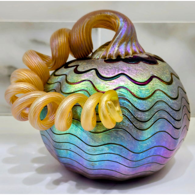 Offer a collectible studio art glass pumpkin by Eric Dandurand of Harmony Glassworks, handblown in Harmony, California and...
