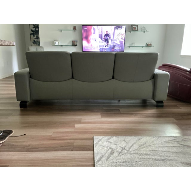 Stress light grey sofa all three backs recline, in wonderful condition always maintained and conditioned very soft, this...