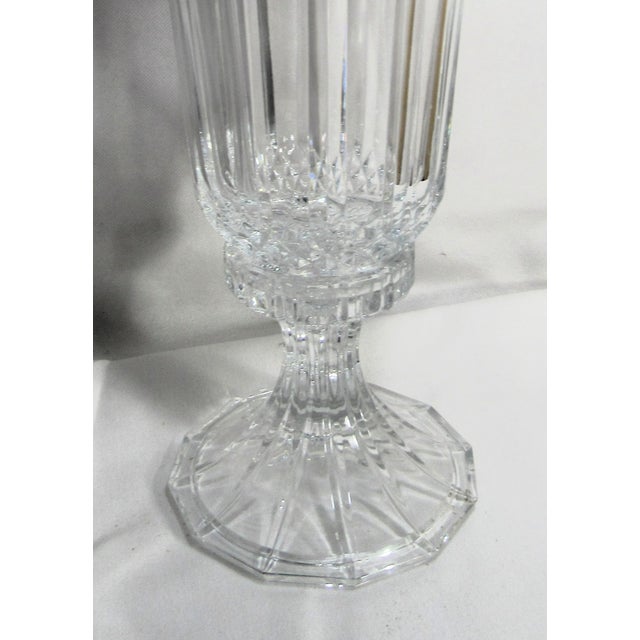 This is an elegant candle lamp in 2 parts, the heavy glass shade and the heavy glass stand. The cut glass is many faceted...