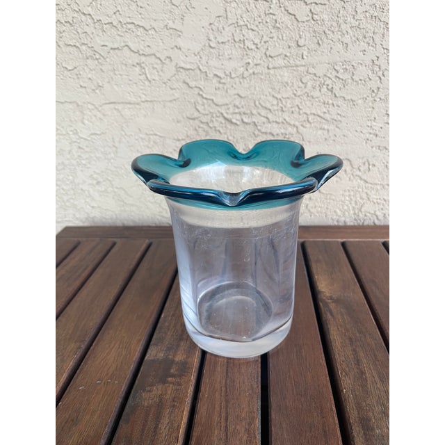 Here is a signed piece of Kosta Boda which I've used a number of times as an ice bucket for white wine and champagne. It...