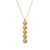 Sophisticated geometry meets sun-kissed elegance. Fall in love with this striking vertical bar pendant necklace. Featuring...