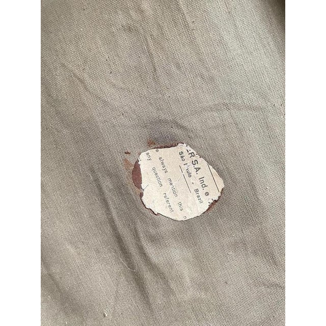 This stunning set is an iconic piece of Brazilian modernism, combining functionality and aesthetics. The chair and ottoman...