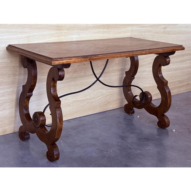 Spanish rectangular coffee table with lyre Legs and iron stretcher.