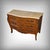 An elegant commode, crafted in the Louis XV style during the second half of the 20th century, this piece is distinguished...
