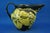 A fabulous glazed and vitrified ceramic jug, entirely hand-crafted on a lathe and decorated with bunches of grapes and...
