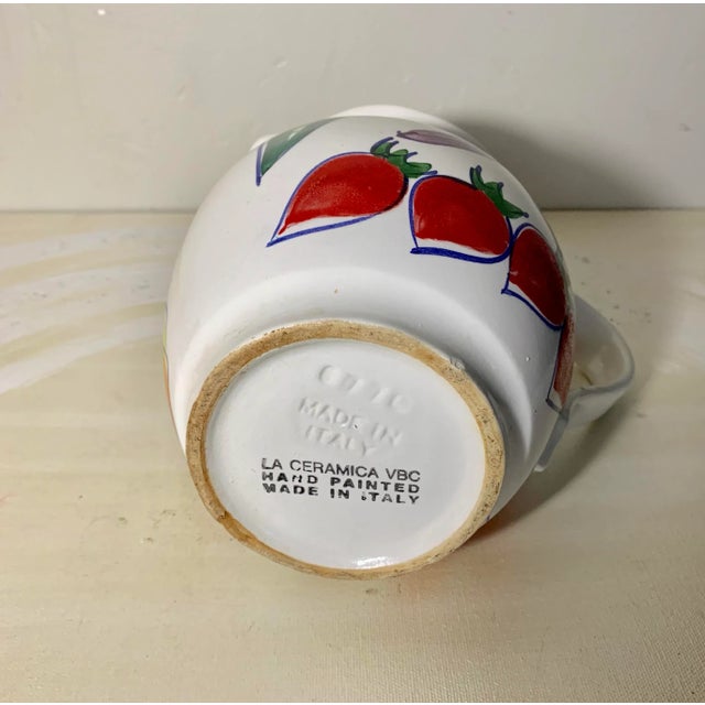 Beautiful hand painted pitcher from Italy with various vegetables; peas, carrots, artichoke, radish, tomatoes. Stamped on...