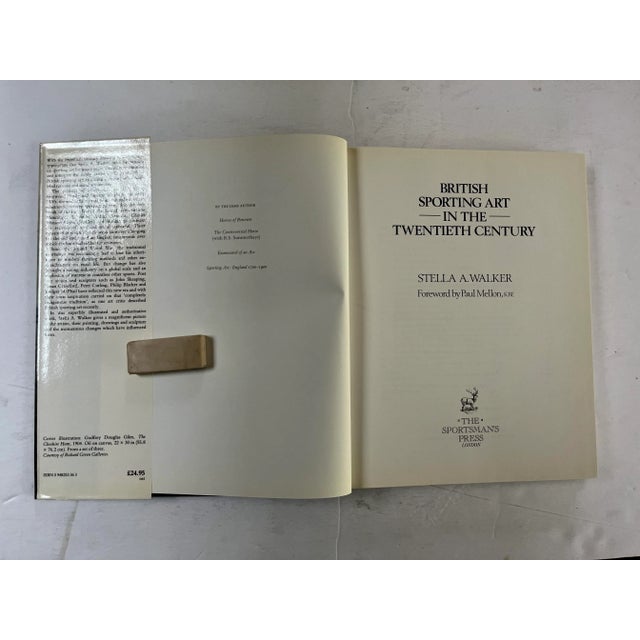 History of the Sporting Art of Hunting and Horse Racing. 224 pages, index, selected bibliography. Color illustrated d.j....