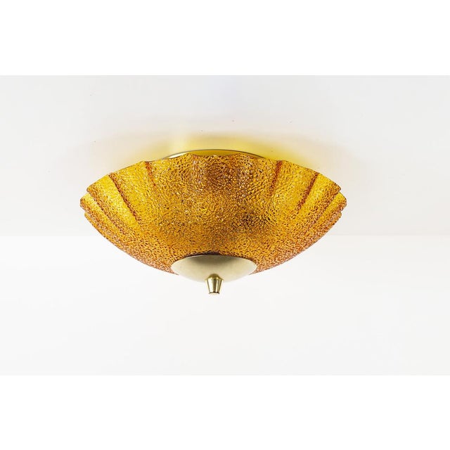 Vintage brass and amber glass ceiling flush mount light, made in Germany during the 1980’s. In great condition without...
