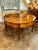 This 19th century Italian walnut demi-lune center table is a stylish and versatile piece of furniture perfect for the...