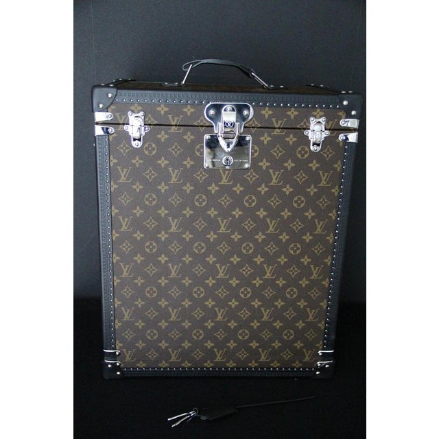 This bespoke Louis Vuitton watch trunk is a refined collector's case, designed to store and protect a collection of 40...