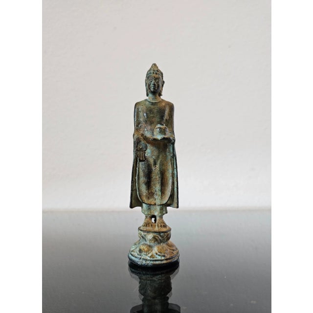 A scarce small antique Southeast Asian Ayutthaya Period bronze Bhaisajyaguru (the Buddha of healing and medicine)...