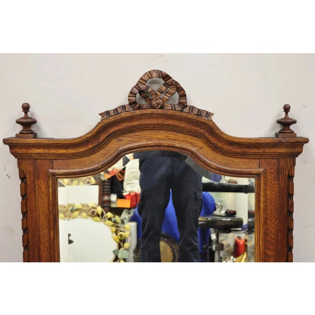 Victorian Antique Victorian Carved Oak Wood Ribbon Crest Beveled Glass Wall Mirror For Sale - Image 3 of 10