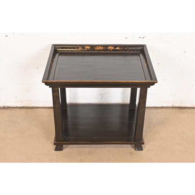 A gorgeous Hollywood Regency Chinoiserie style two-tier tea table or occasional side table By Dessin Fournir USA, Late...