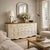 Vintage Painted Wood Sideboard with Paneled Doors. A versatile vintage buffet cabinet finished in a soft neutral paint...