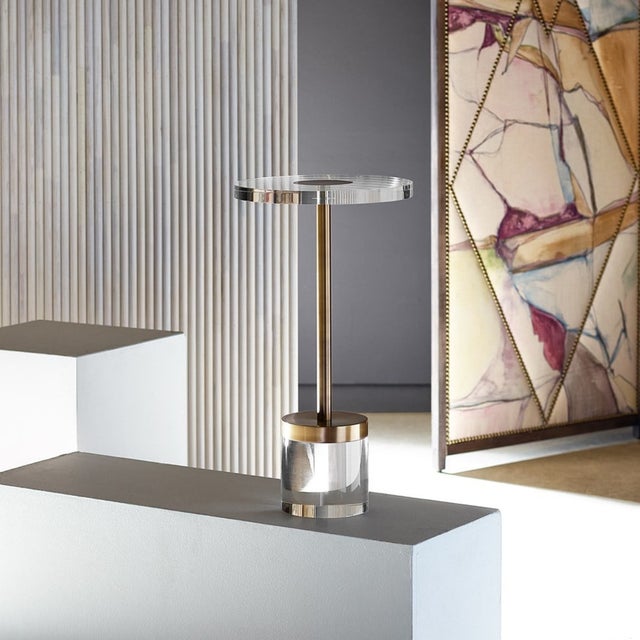 The Deco Martini Table combines modern elegance with minimalist design, featuring a clear acrylic top paired with a soft...