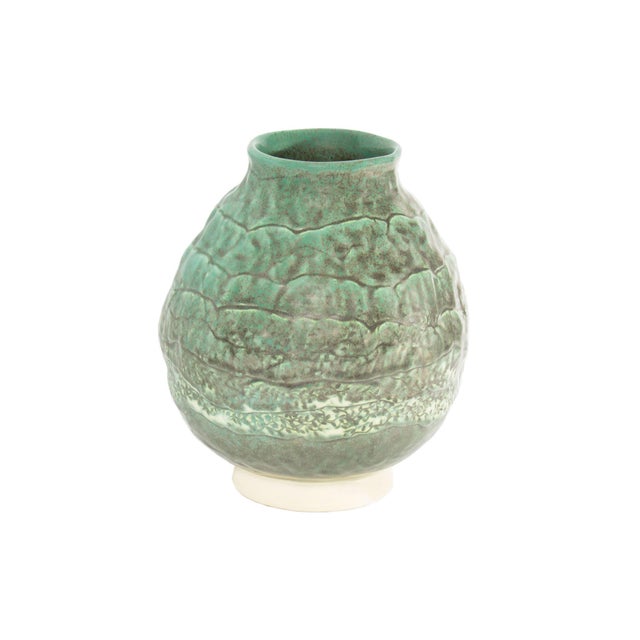 A 2012 studio pottery vase by Gordon Martz (1924-2015). This vase features a bulb-like shape with a green glaze. The vase...
