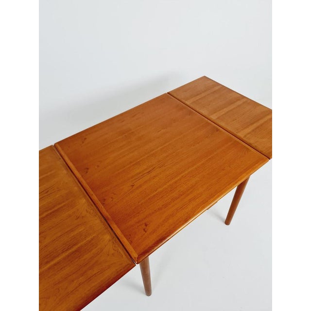 Mid centruy Danish Teak Dining Table By Am Ansager Mobler, 1960s The table is in very good condition. Made of teak...