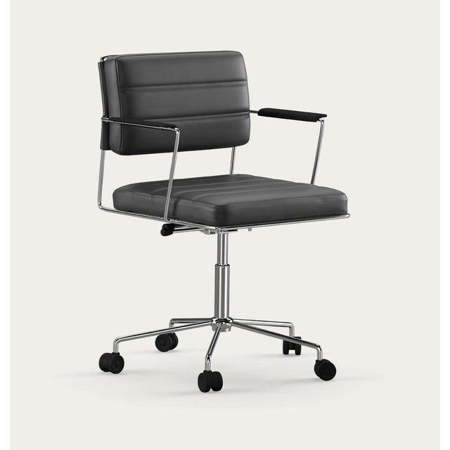 Henrik tengler time chair fram: chrome upholstery: black for one collection the time chair, designed by henrik tengler in...