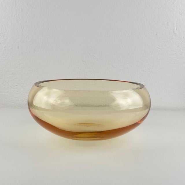 A striking hand-blown Murano glass centerpiece by Simone Cenedese, signed on the base, distinguished by its exceptional...