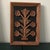 Carved wood wall hangings. Set of three depicting plants, flowers. Organic spa like feel.