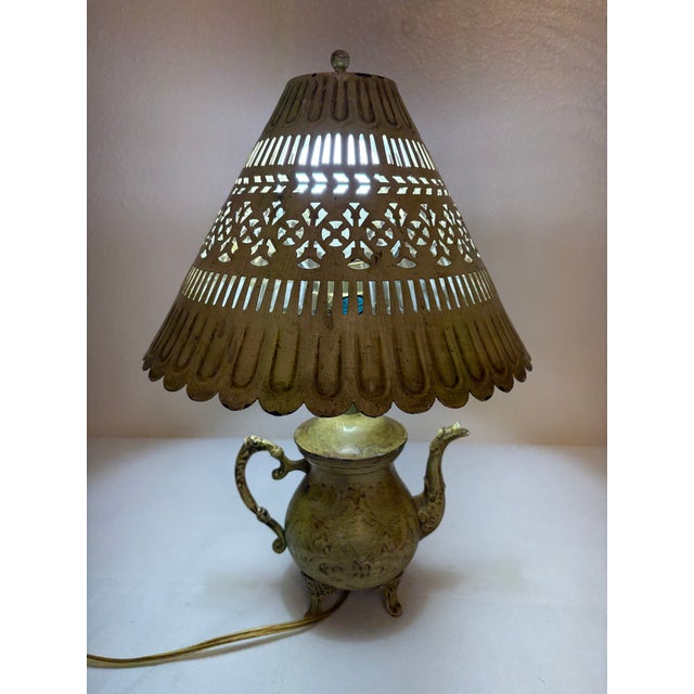 Add an enchanting, bohemian glow to your interior decor with this striking vintage 1960s brass teapot accent yellow table...