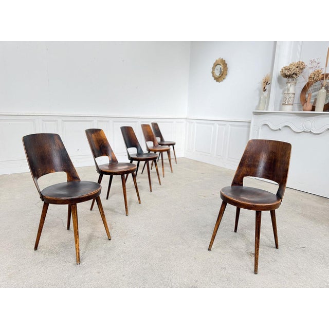 A collection of several dozen chairs from the French manufacturer Baumann, designed in the 1960s. This is the Mondor...