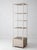 Beautiful vintage white wicker étagère dating to the 1960s–1970s, showcasing a charming blend of Coastal and Hollywood...